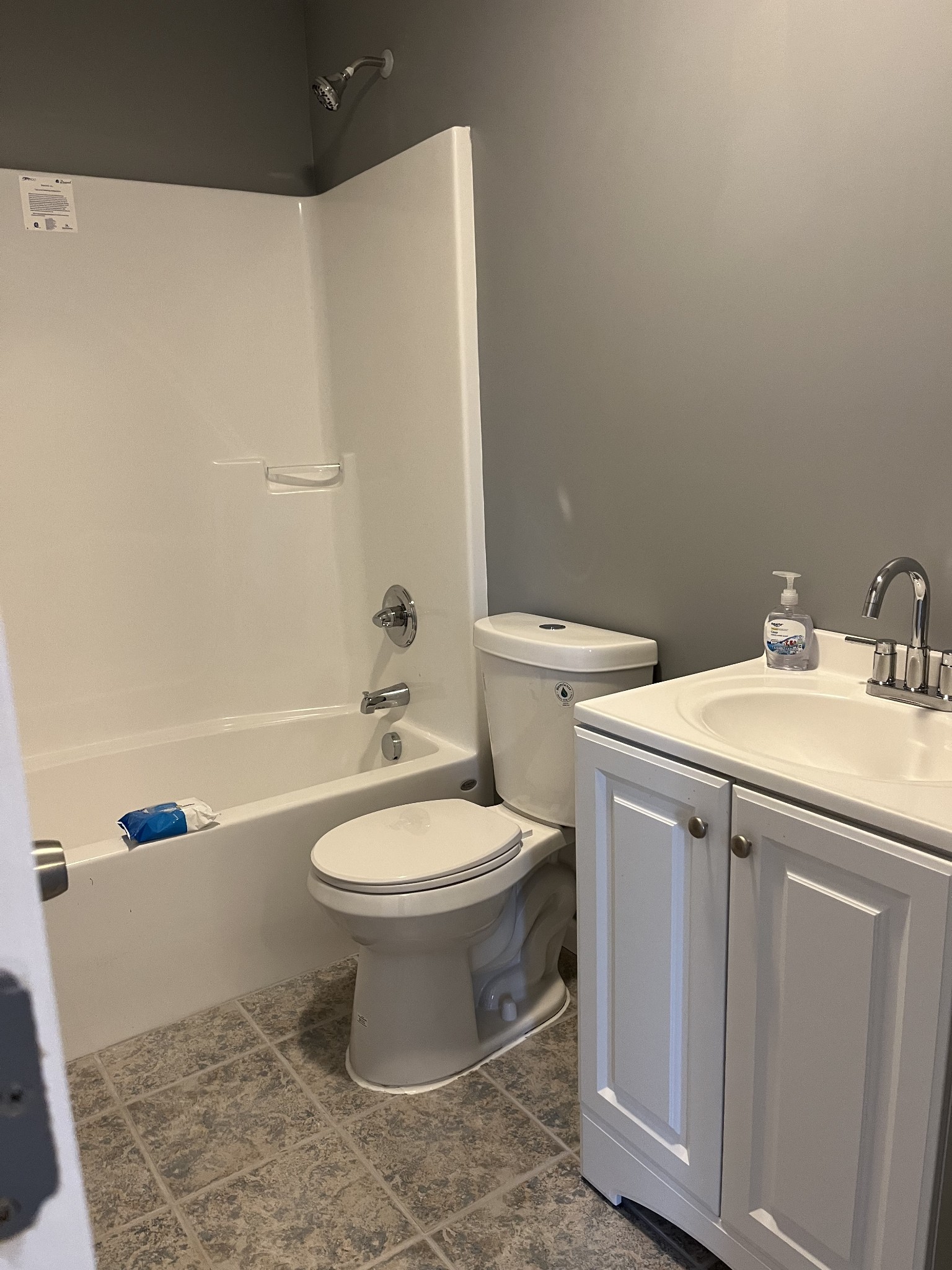 203 5th Avenue North Decherd, TN 37324 - Photo 7 of 13 a bathroom with a sink toilet and shower