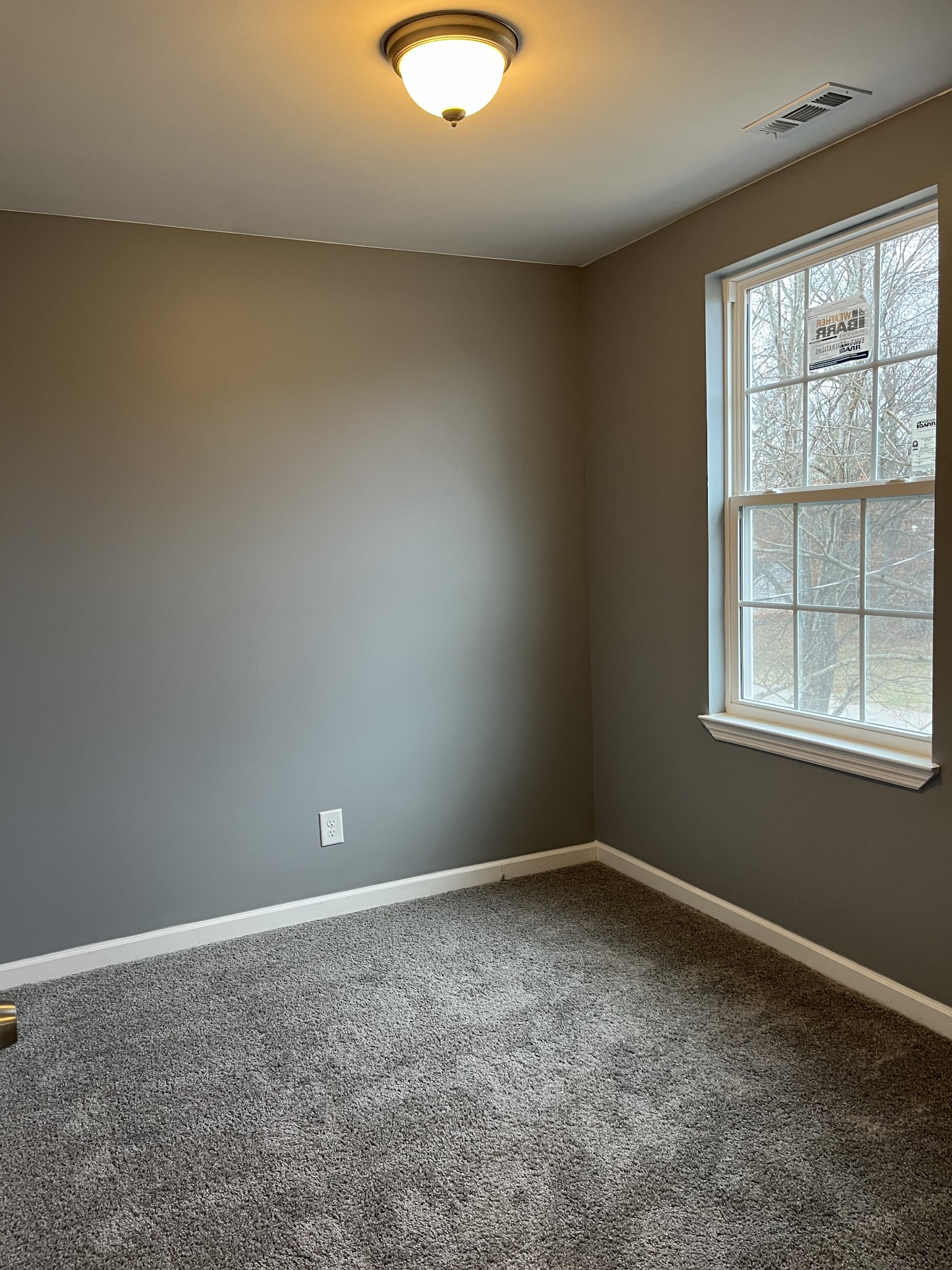 203 5th Avenue North Decherd, TN 37324 - Photo 9 of 13 an empty room with a window