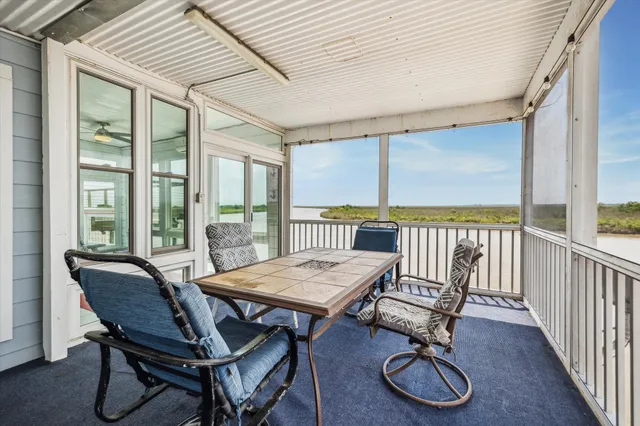 a view of a room with a table and chair