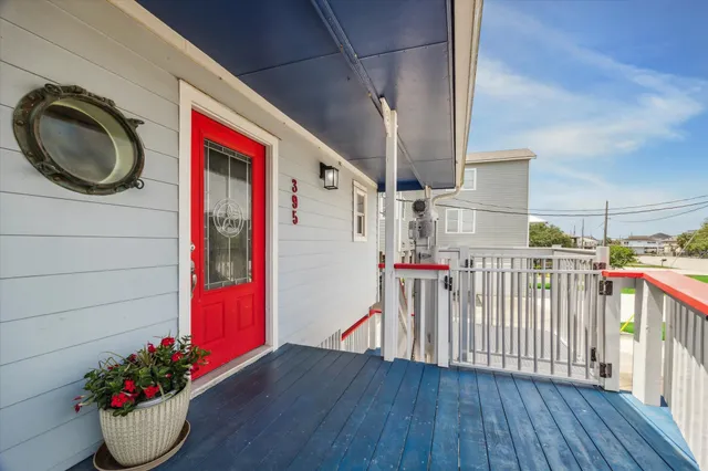 a view of a porch with seating space