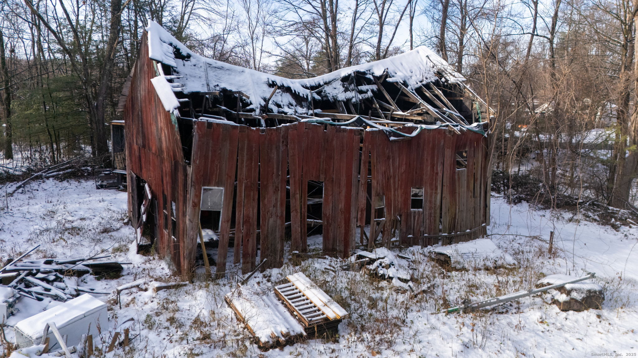 434 Tunxis Avenue Bloomfield, CT 06002 - Photo 11 of 12 a view of a wooden fence