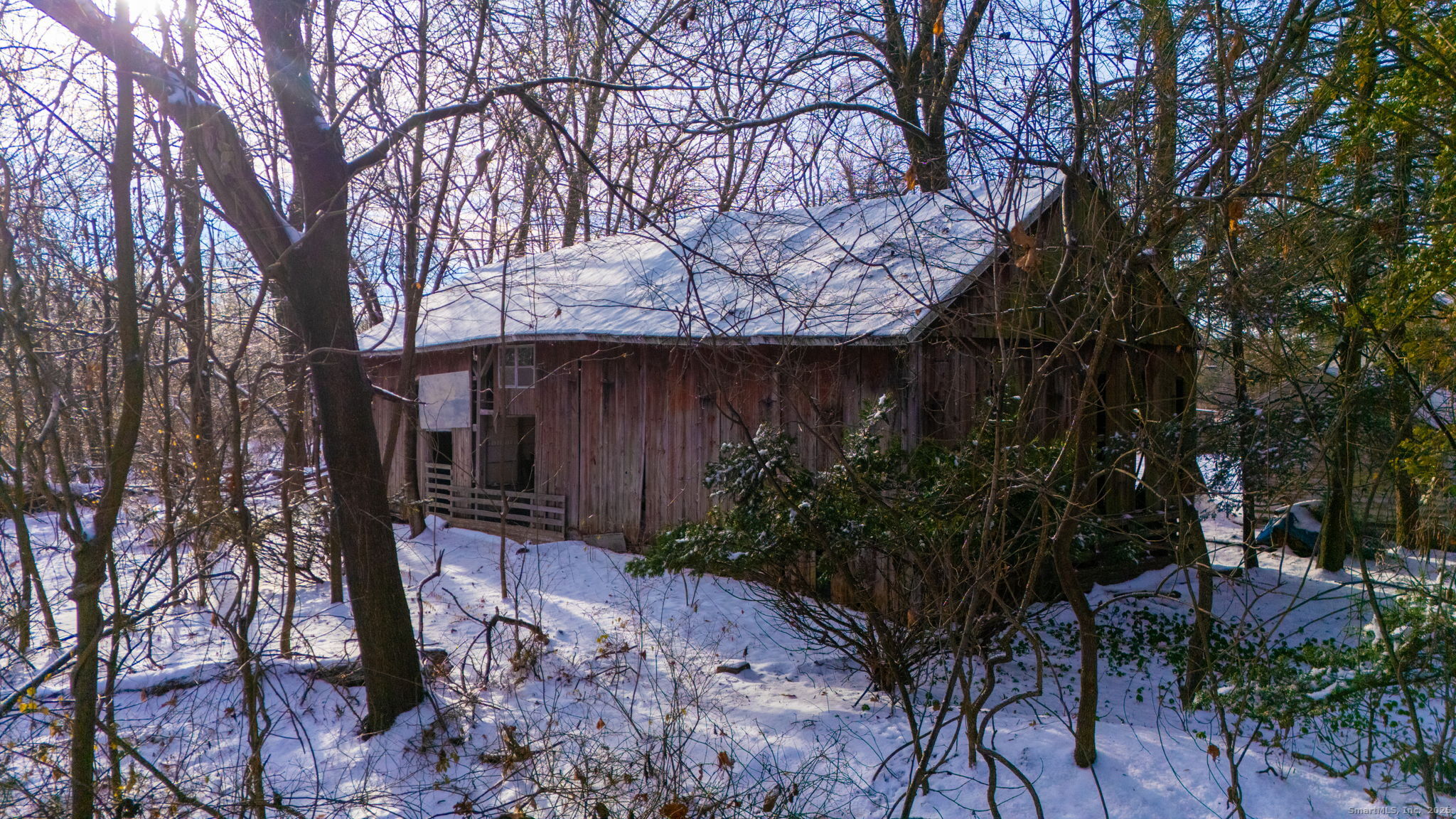 434 Tunxis Avenue Bloomfield, CT 06002 - Photo 12 of 12 a backyard of a house with lots of green space