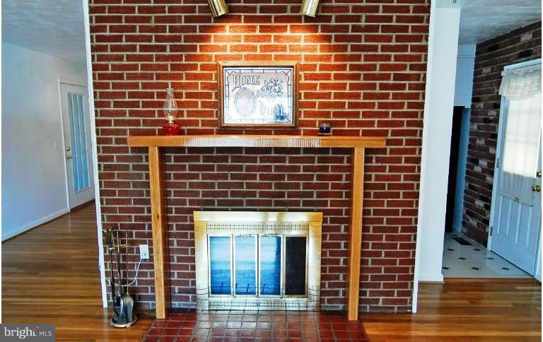 321 Brock Bridge Road Laurel, MD 20724 - Photo 4 of 20 a front view of a building with glass windows
