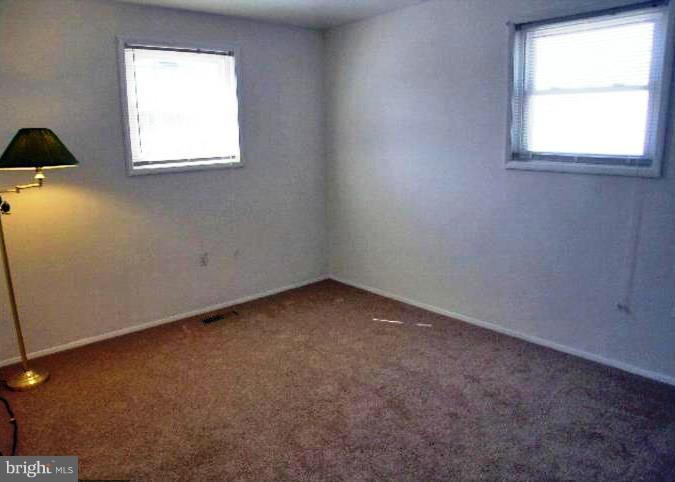 321 Brock Bridge Road Laurel, MD 20724 - Photo 9 of 20 an empty room with a window