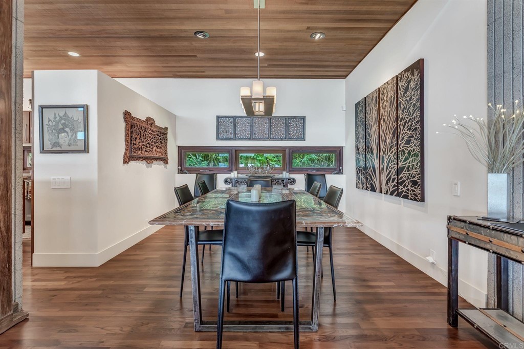 2054 Sheridan Road Encinitas, CA 92024 - Photo 20 of 58 a view of a dining room with furniture window and wooden floor