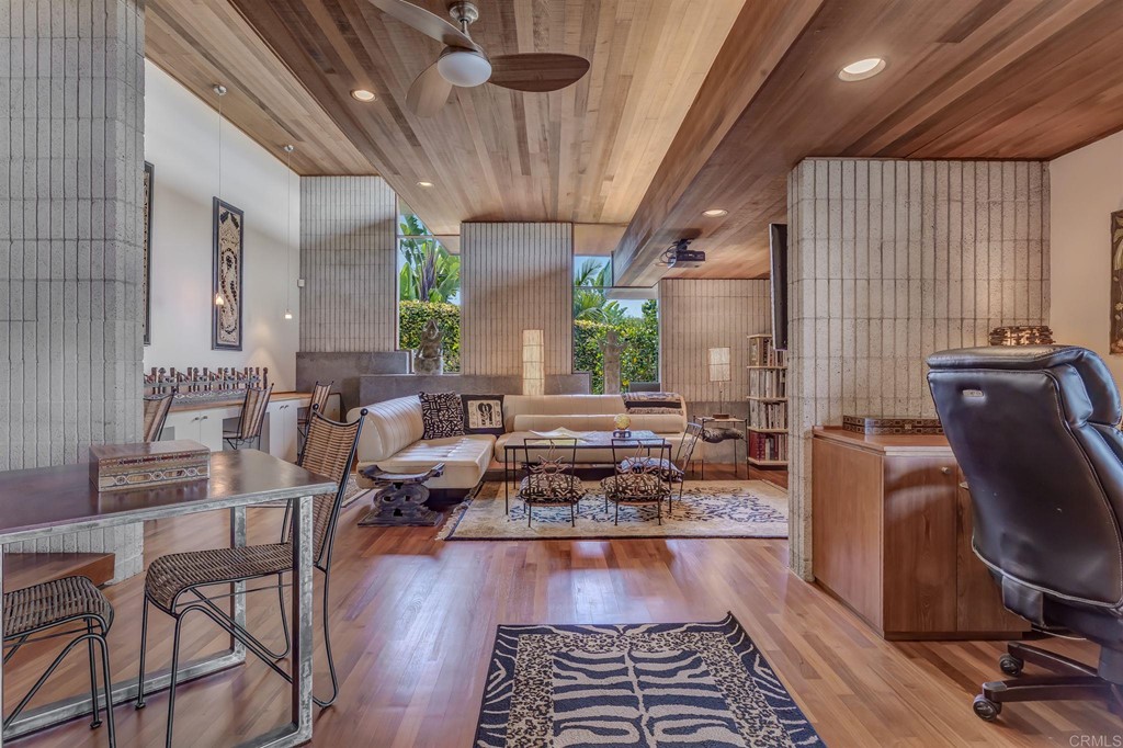 2054 Sheridan Road Encinitas, CA 92024 - Photo 24 of 58 a living room with fireplace furniture and a large window
