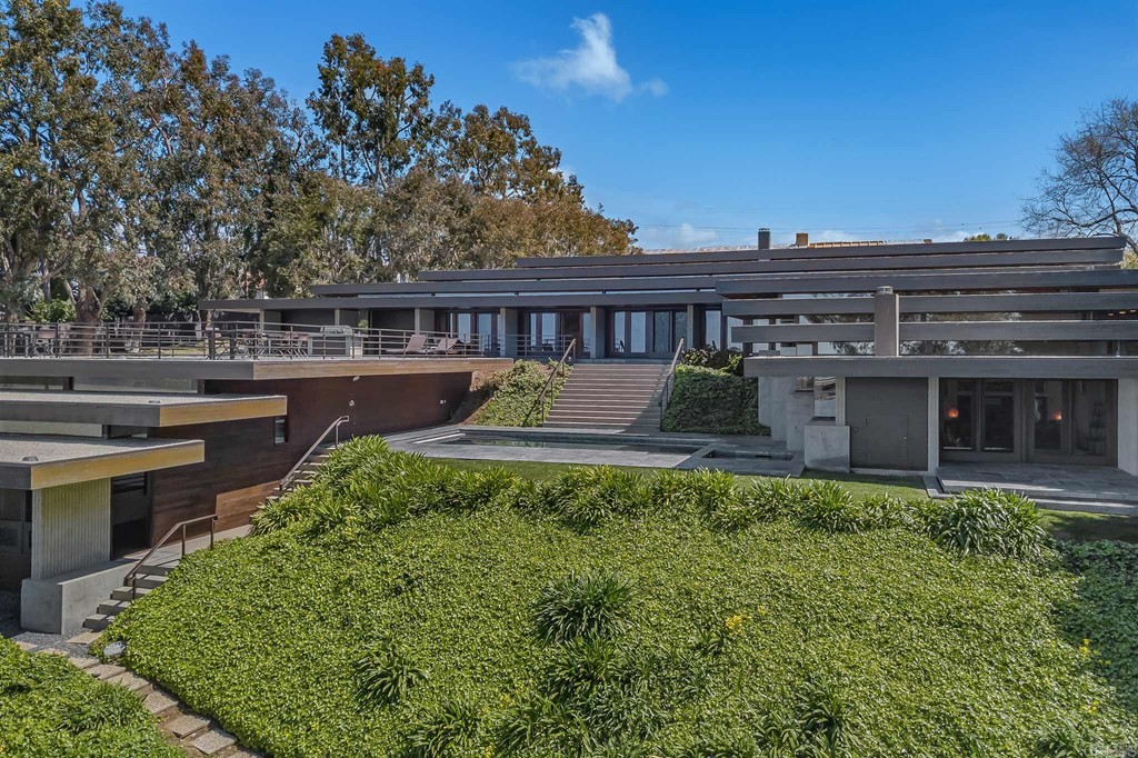 2054 Sheridan Road Encinitas, CA 92024 - Photo 3 of 58 a view of a house with a garden and plants