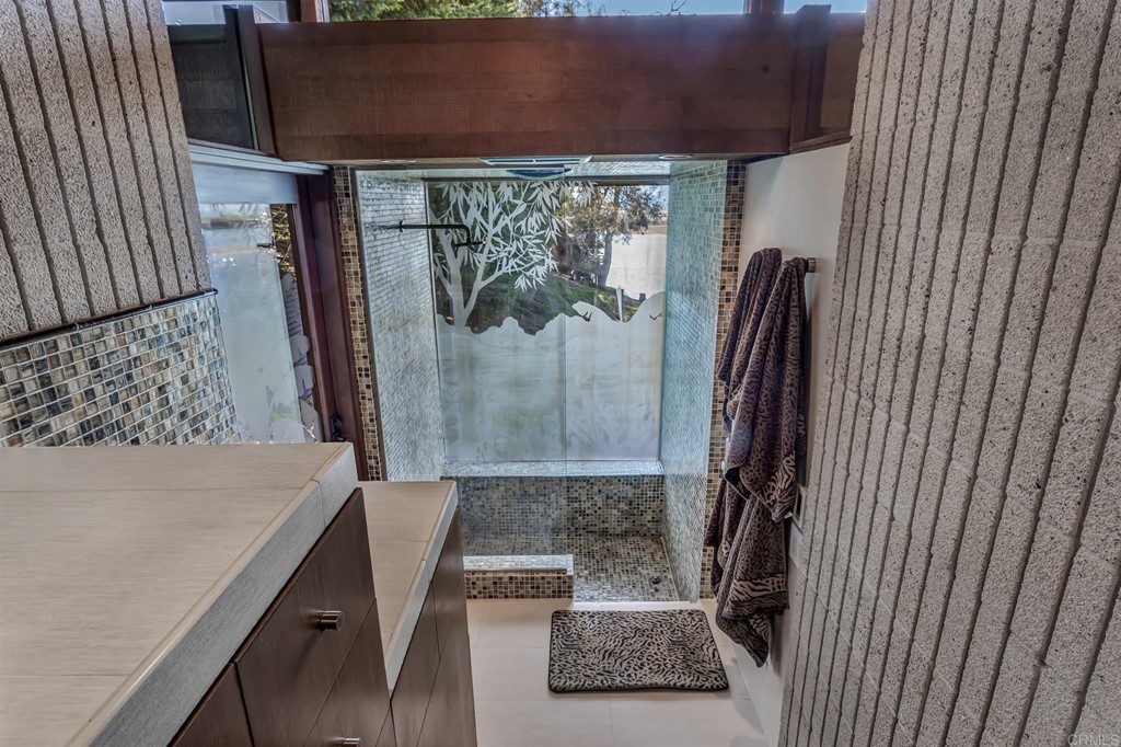 2054 Sheridan Road Encinitas, CA 92024 - Photo 33 of 58 a view of bathroom with a tub and shower