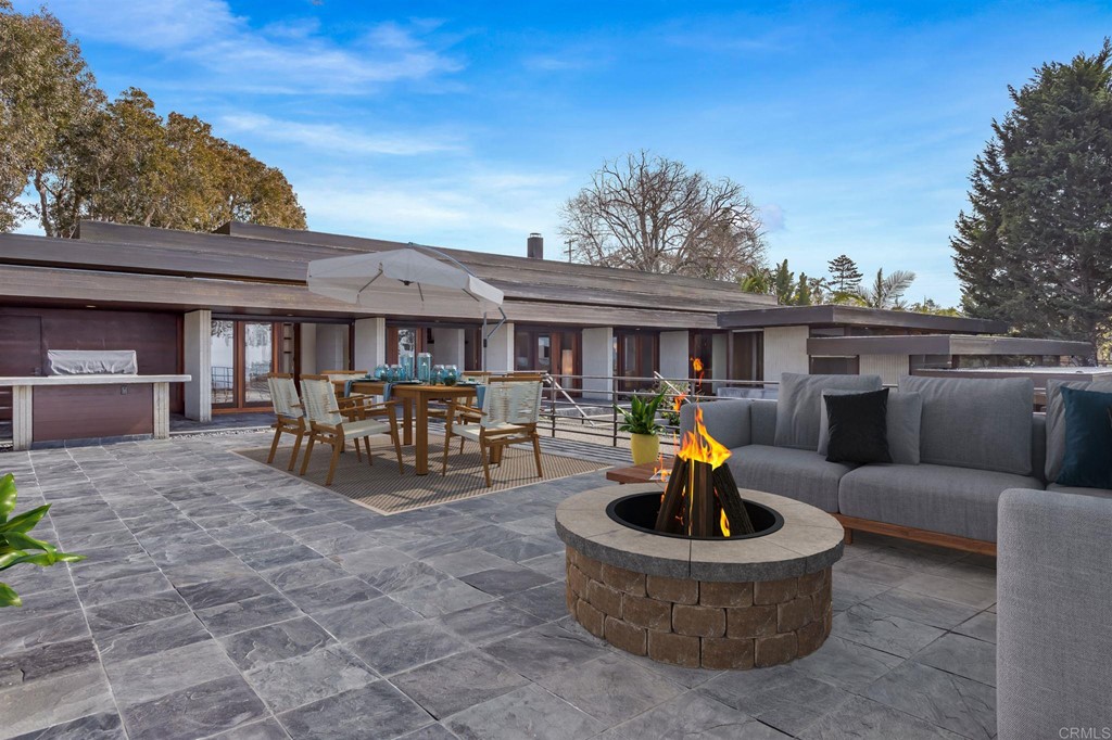 2054 Sheridan Road Encinitas, CA 92024 - Photo 52 of 58 a outdoor seating area with furniture a fire pit and outdoor seating