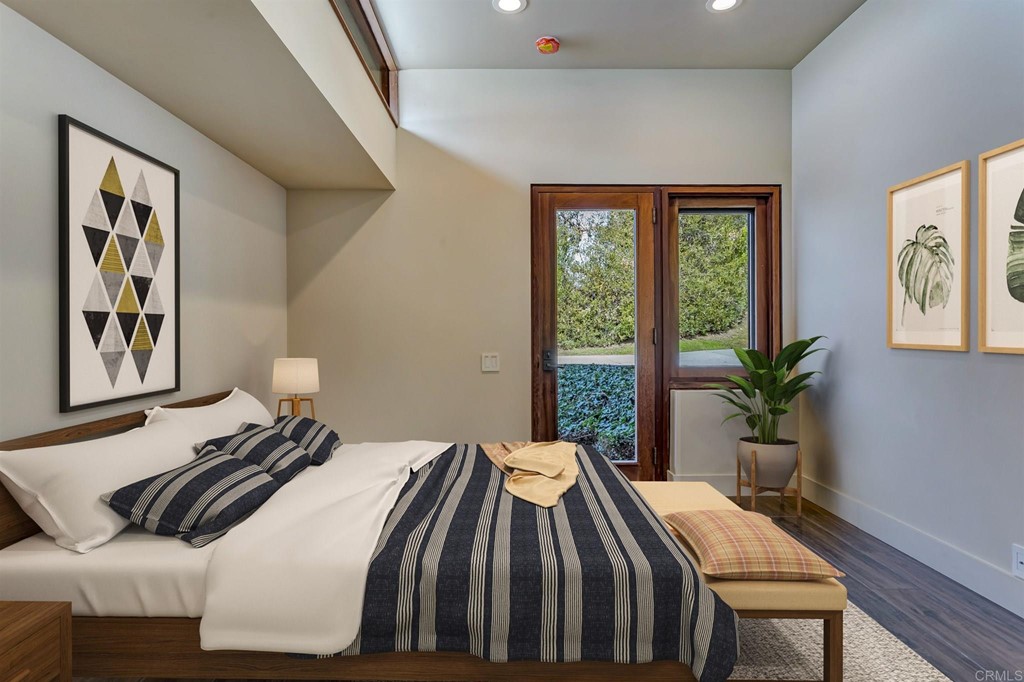 2054 Sheridan Road Encinitas, CA 92024 - Photo 57 of 58 a bedroom with a bed and a large window