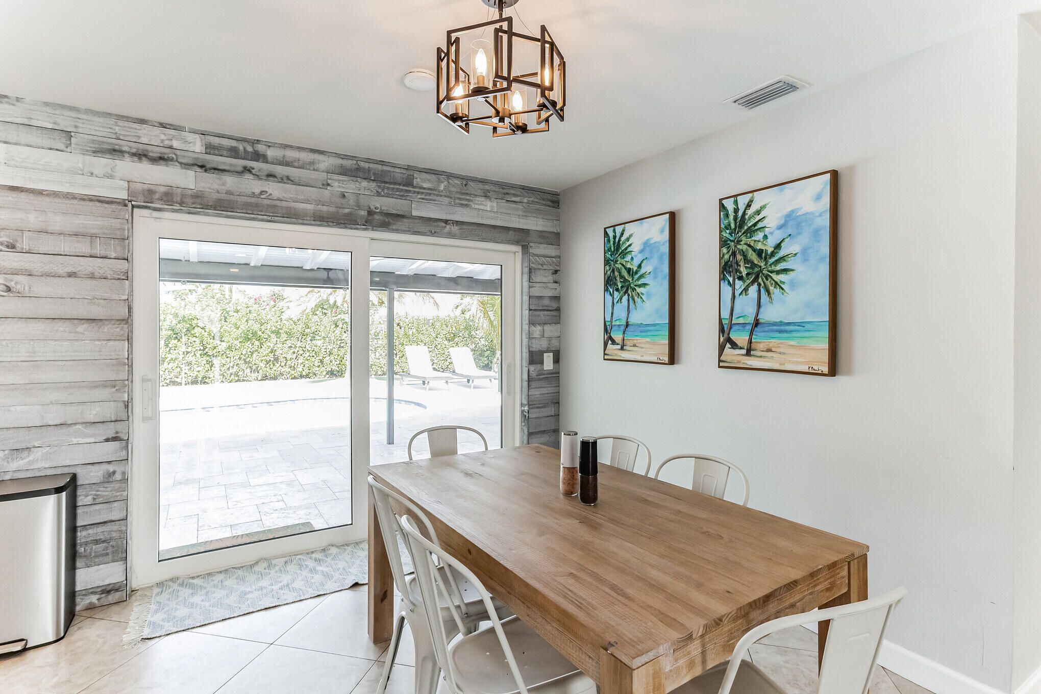 19 Willow Road Tequesta, FL 33469 - Photo 11 of 31 a view of a dining room with furniture window and outside view