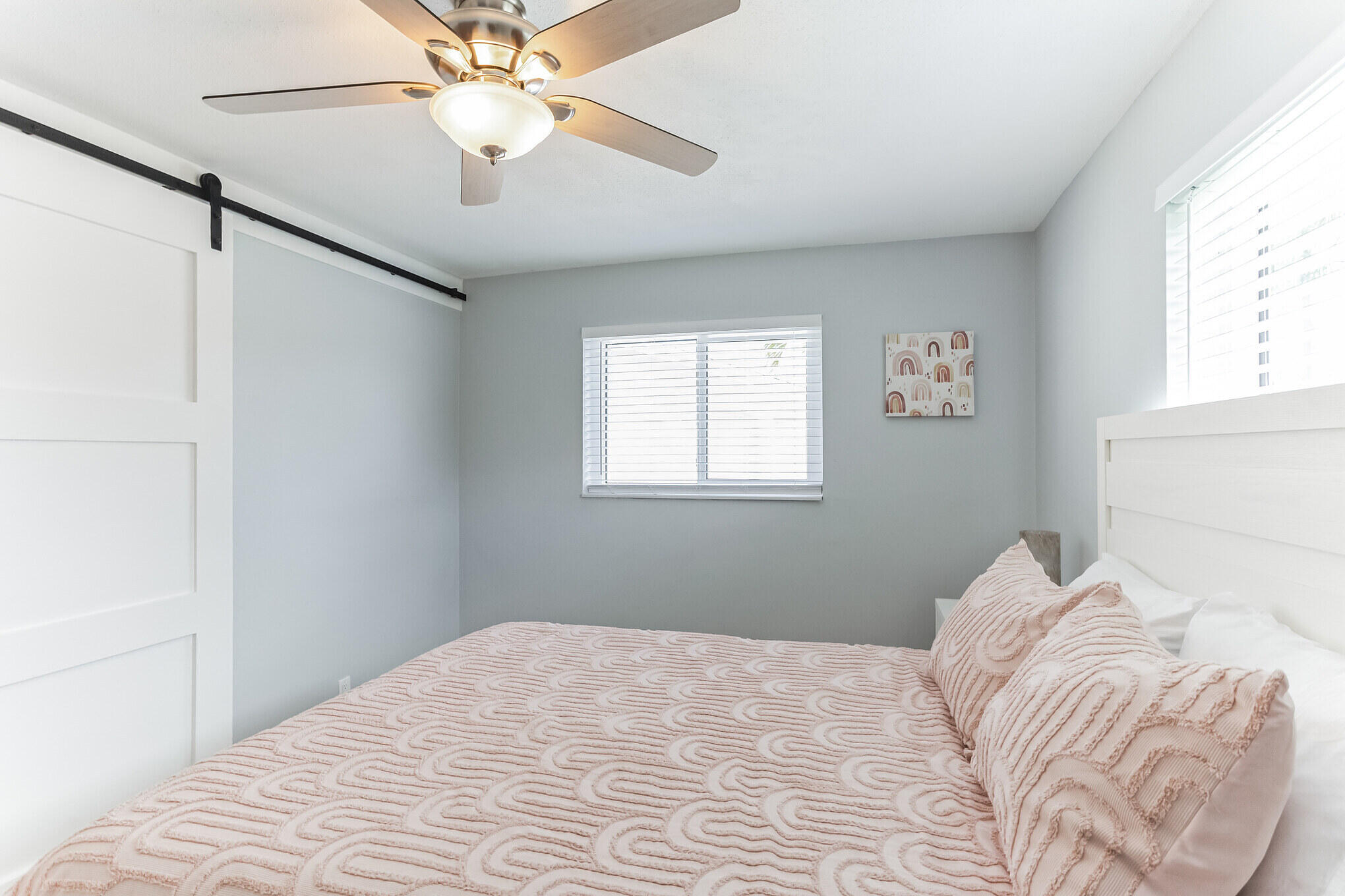 19 Willow Road Tequesta, FL 33469 - Photo 23 of 31 a bedroom with a bed and a window