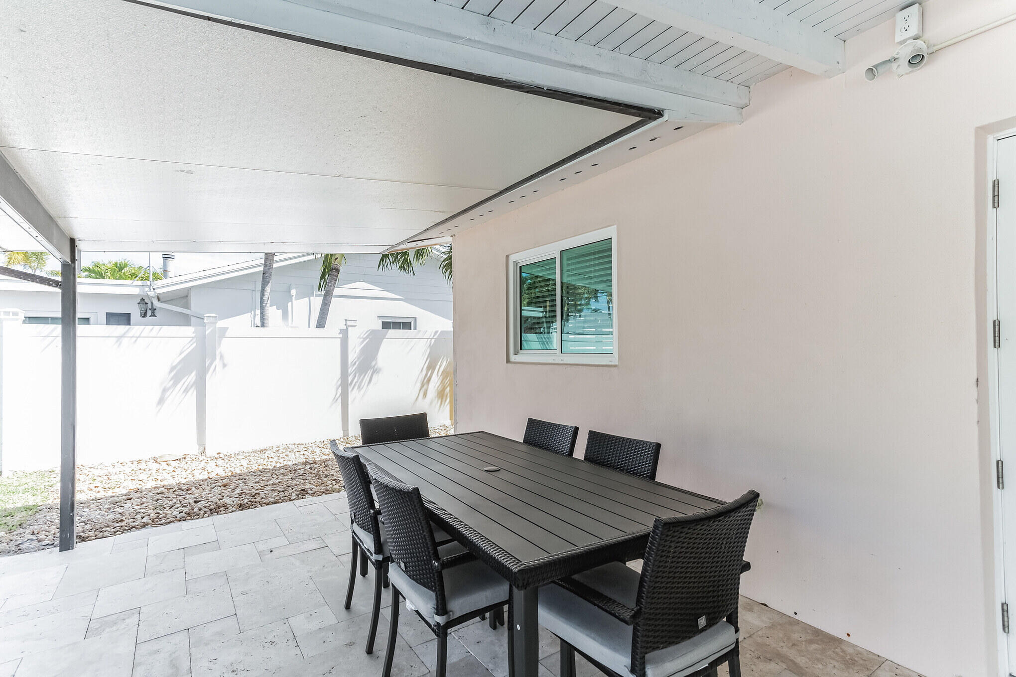 19 Willow Road Tequesta, FL 33469 - Photo 28 of 31 a dining room with a table and chairs