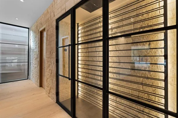 a view of an empty room with a balcony
