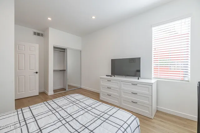 a view of livingroom with washer and dryer