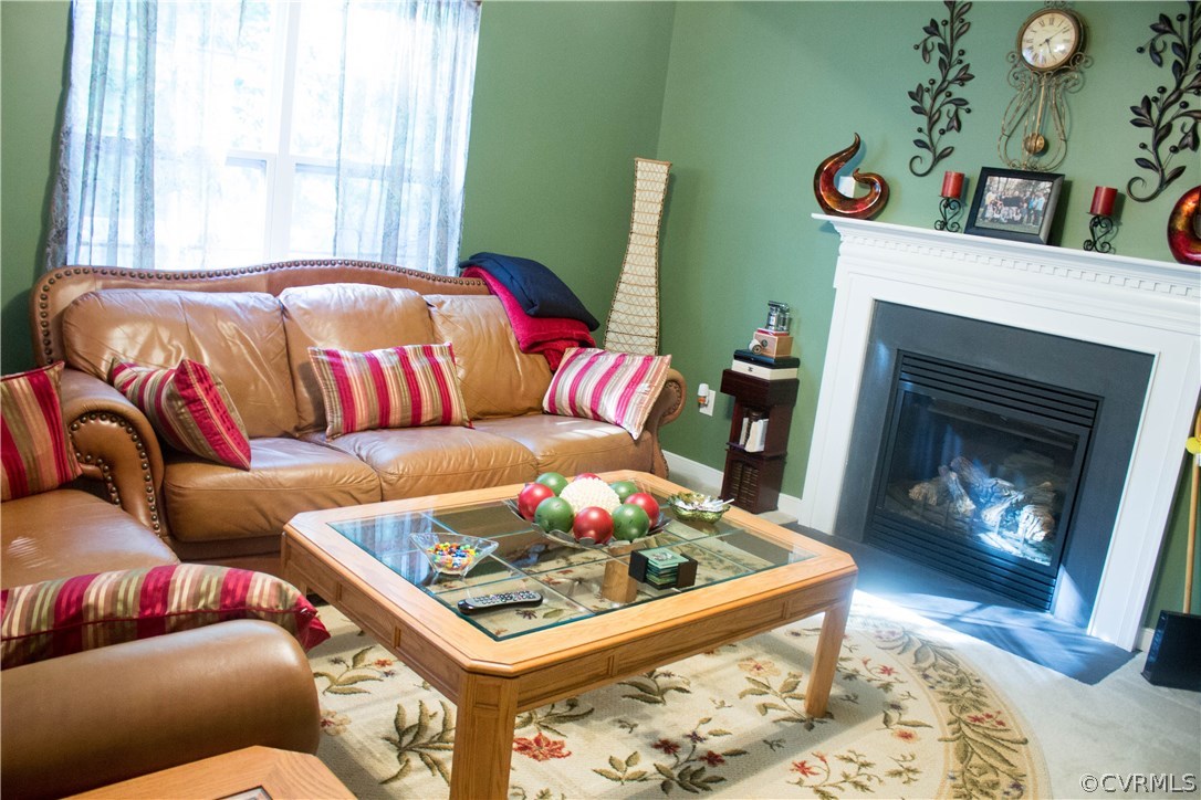5806 Garden Ridge Road Chesterfield, VA 23832 - Photo 5 of 38 a living room with furniture and a fireplace