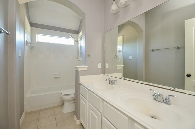 a view of wooden house with a large window