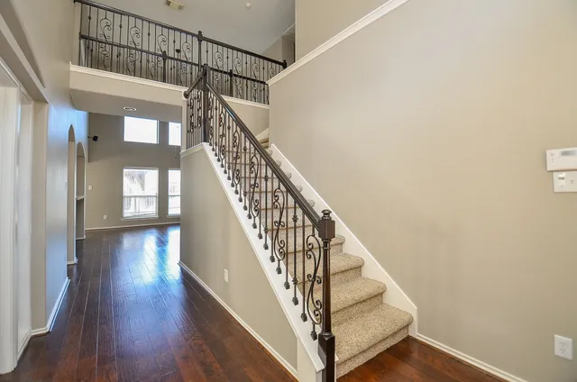 a view of entryway with wooden floor