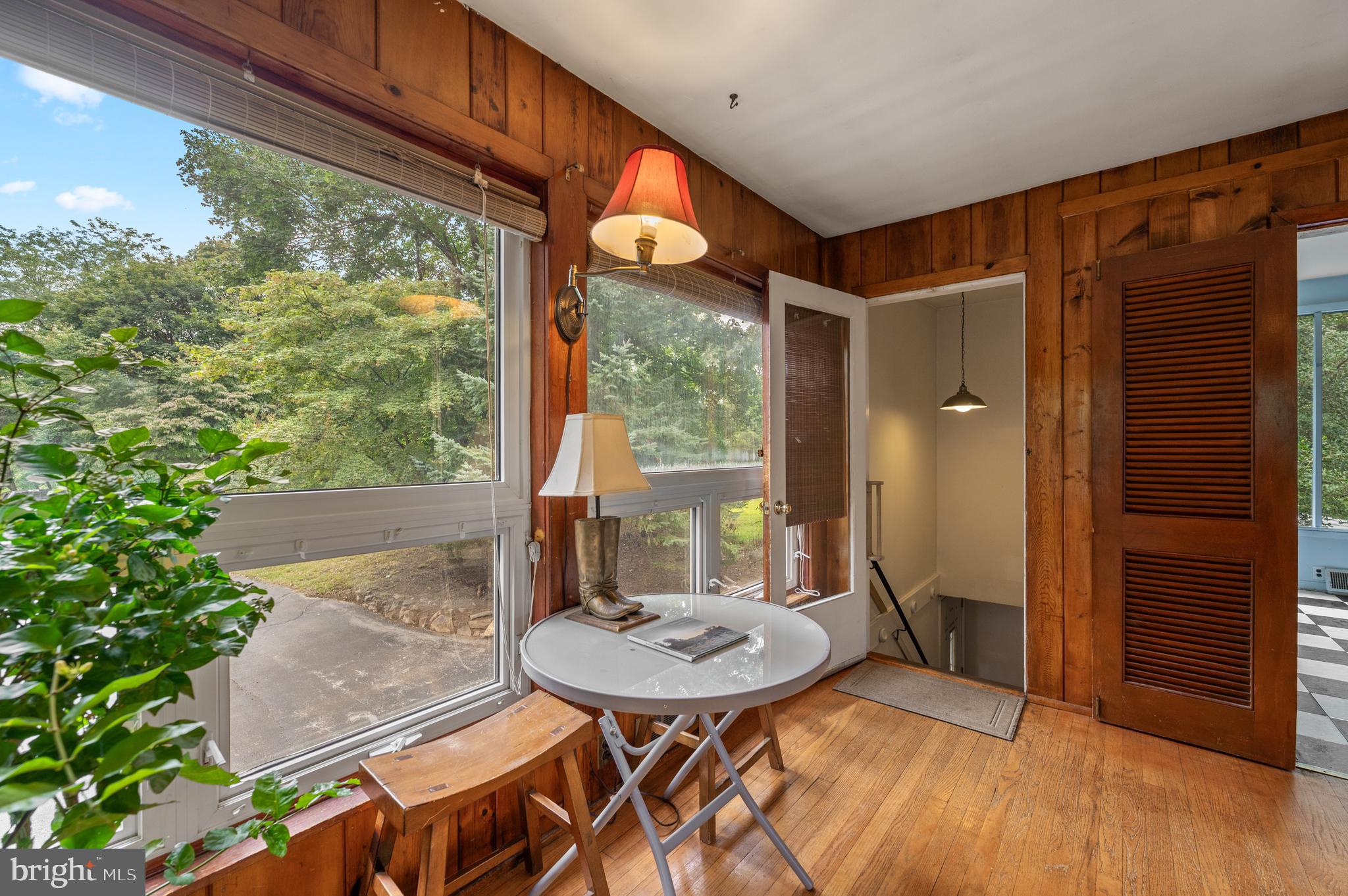 120 Diamond Rock Road Phoenixville, PA 19460 - Photo 52 of 86 a view of a porch with furniture and wooden floor