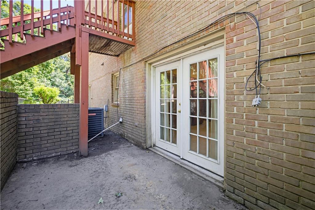 4188 Cedar Valley Lane Conley, GA 30288 - Photo 24 of 28 a view of a house with an iron gate