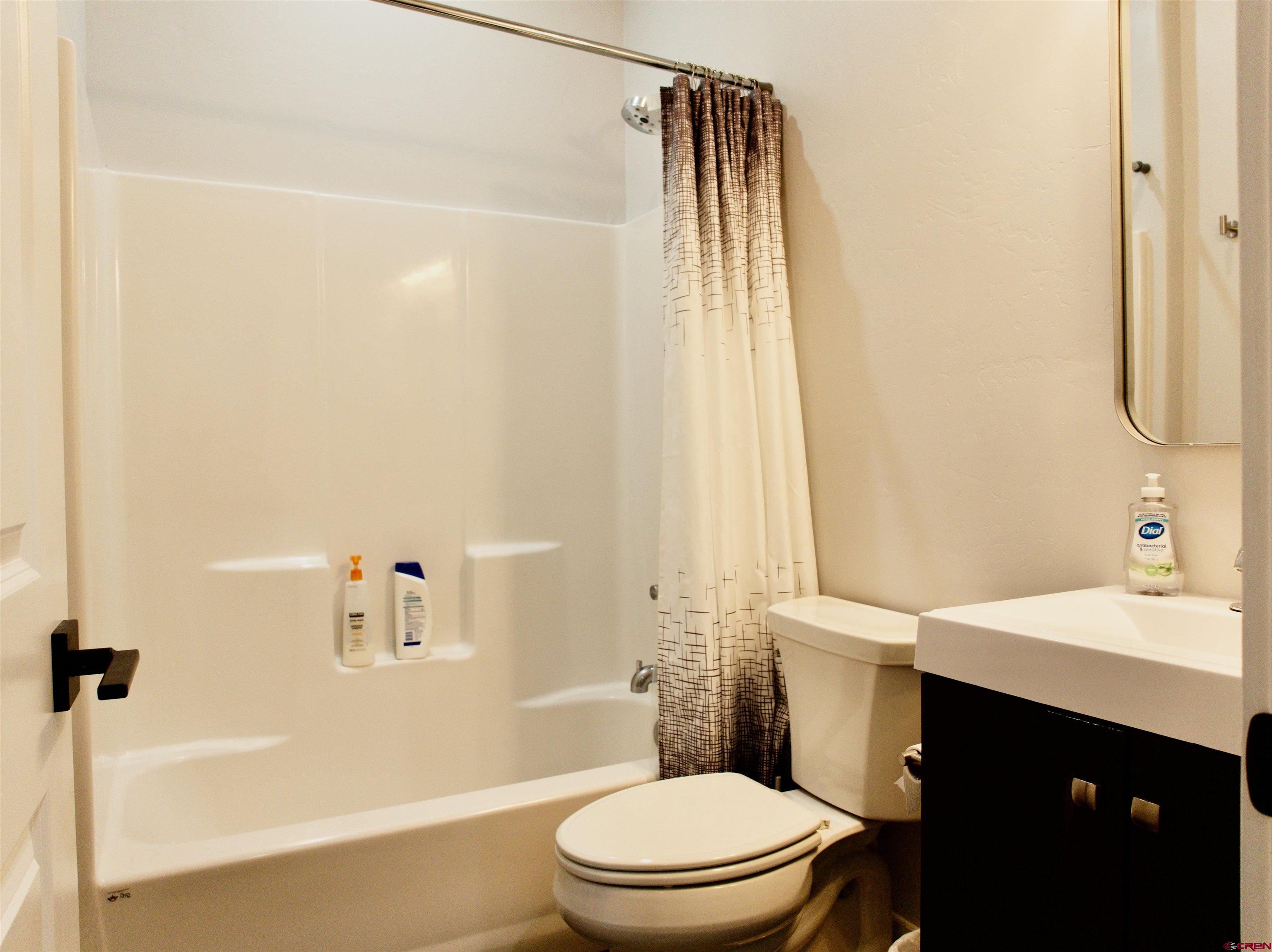 382 Tomichi Trail Gunnison, CO 81230 - Photo 30 of 34 a bathroom with a sink toilet and shower