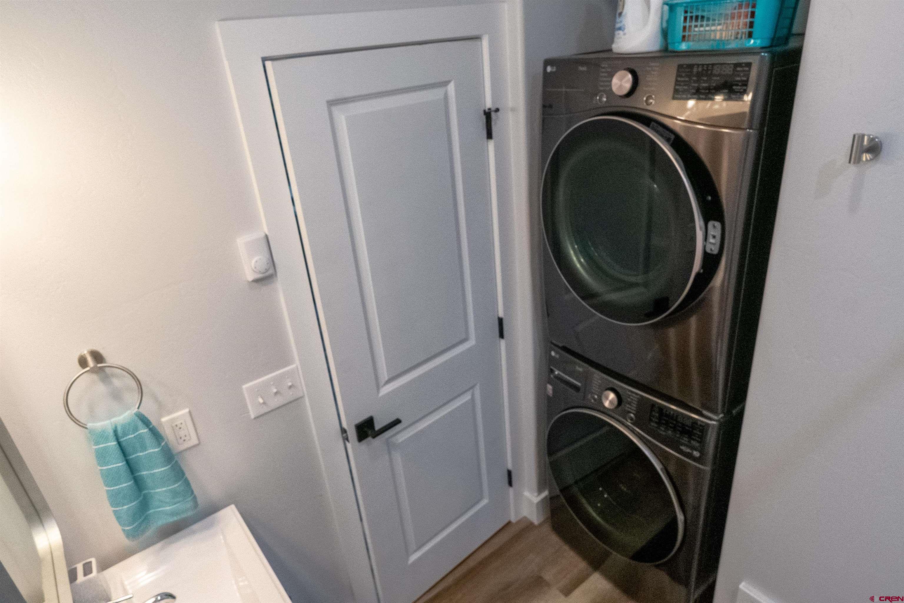 382 Tomichi Trail Gunnison, CO 81230 - Photo 31 of 34 a utility room with dryer and washer
