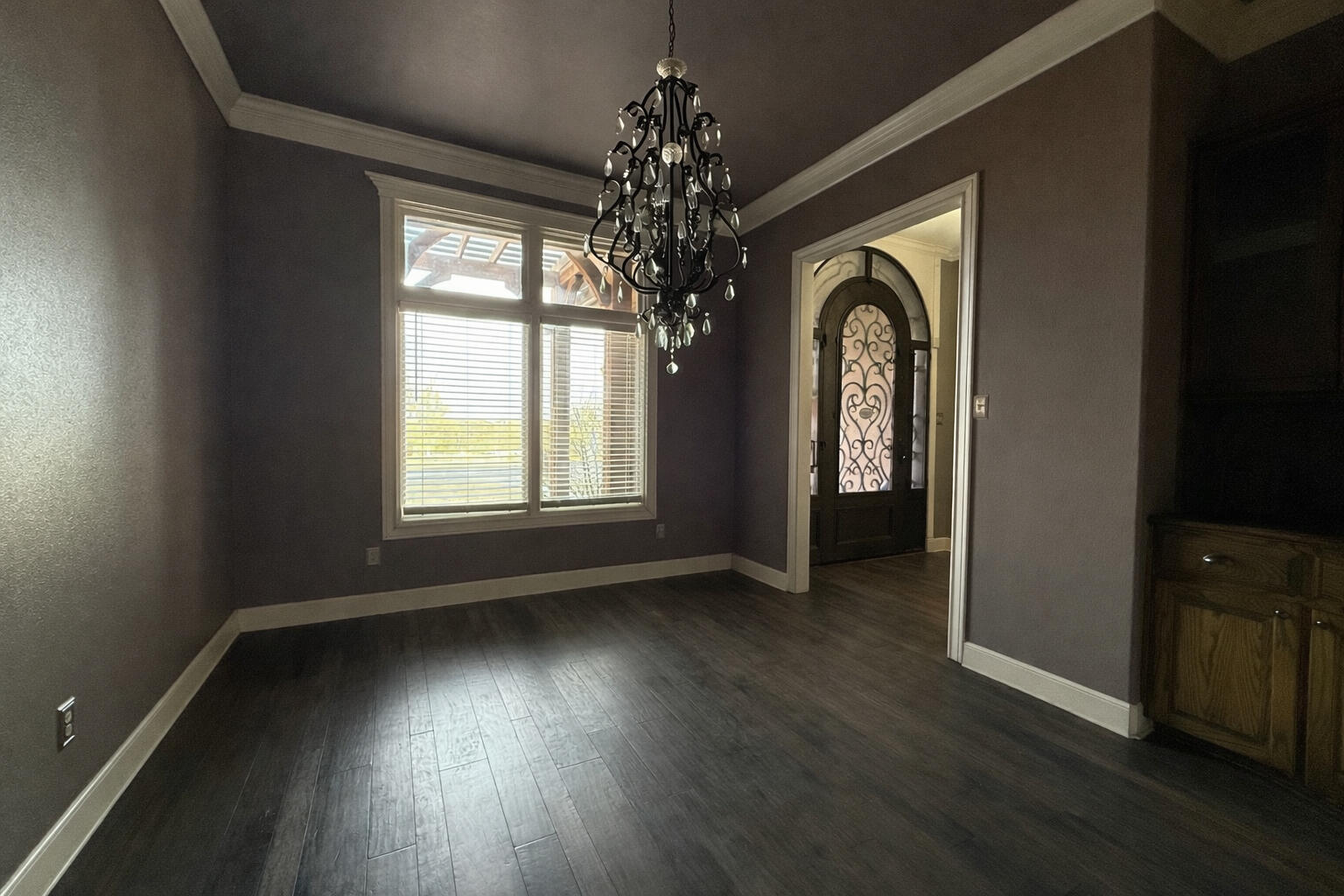 11302 Juneau Avenue Lubbock, TX 79424 - Photo 15 of 49 a view of a livingroom with wooden floor and a window