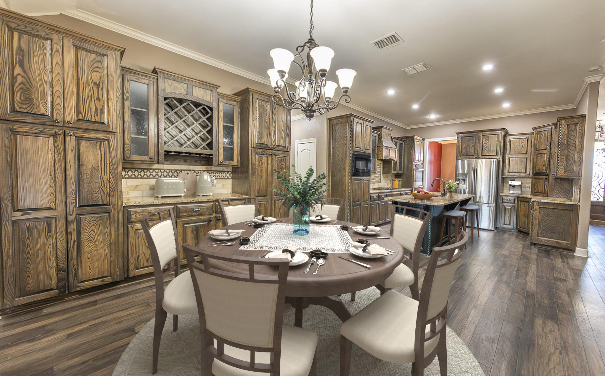 11302 Juneau Avenue Lubbock, TX 79424 - Photo 3 of 49 a view of a dining room with furniture a chandelier and wooden floor