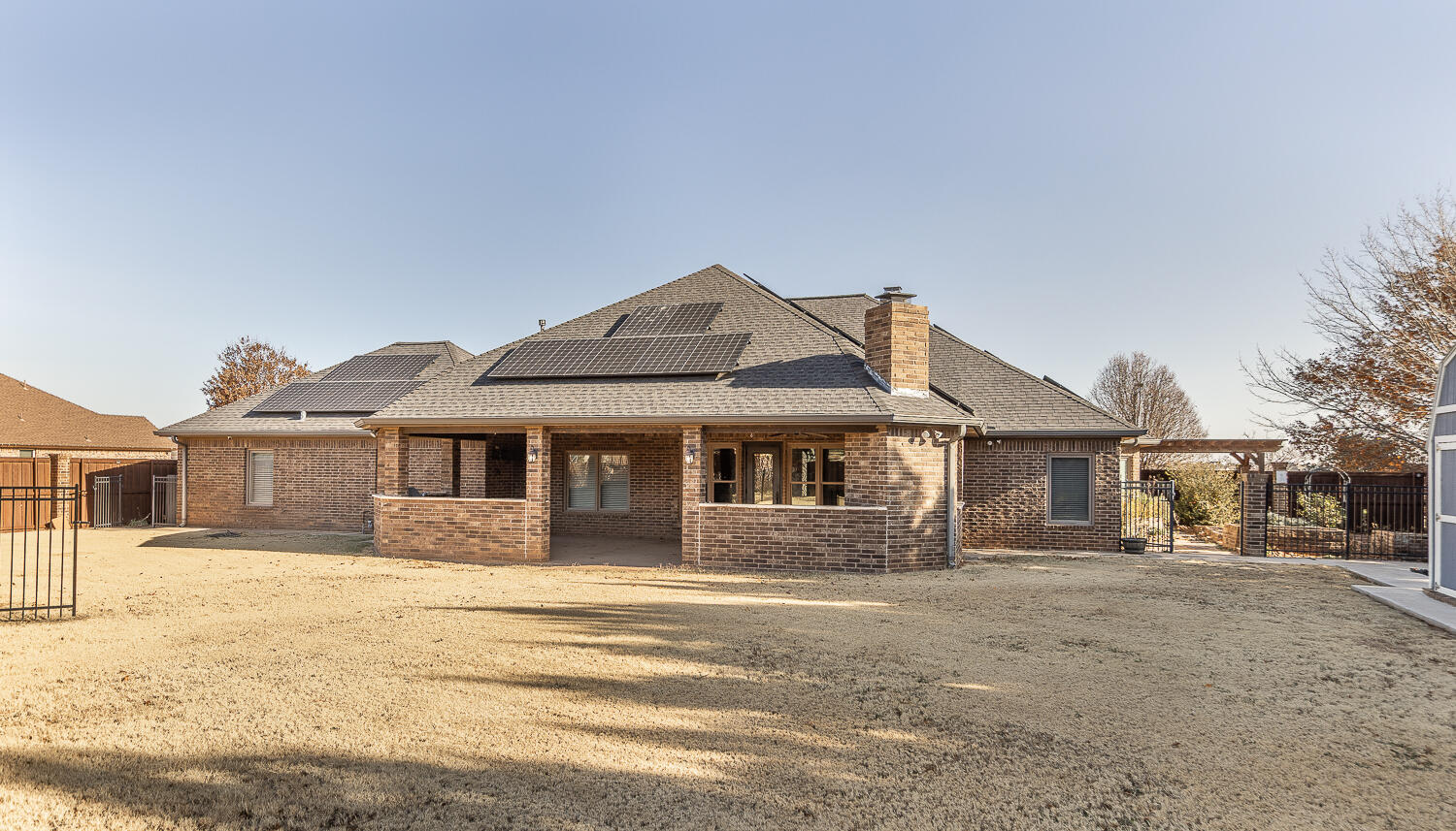 11302 Juneau Avenue Lubbock, TX 79424 - Photo 40 of 49 a front view of a house with a yard