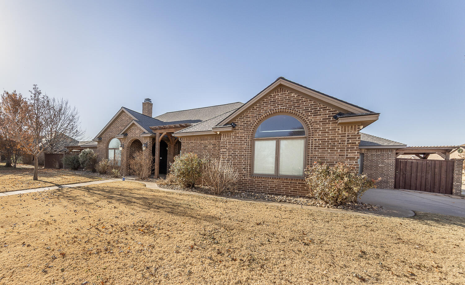 11302 Juneau Avenue Lubbock, TX 79424 - Photo 48 of 49 a front view of a house with a yard