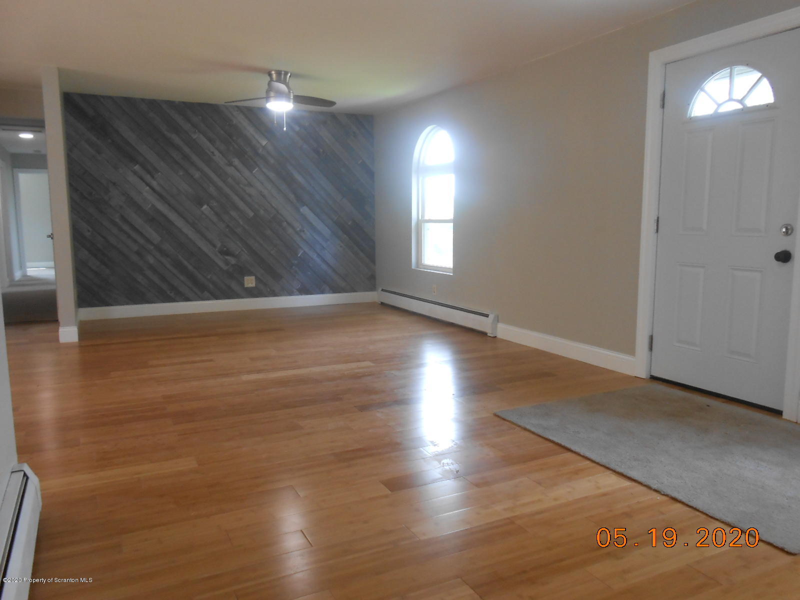 636 Bennett Road Meshoppen, PA 18630 - Photo 3 of 25 a view of room with window and wooden floor