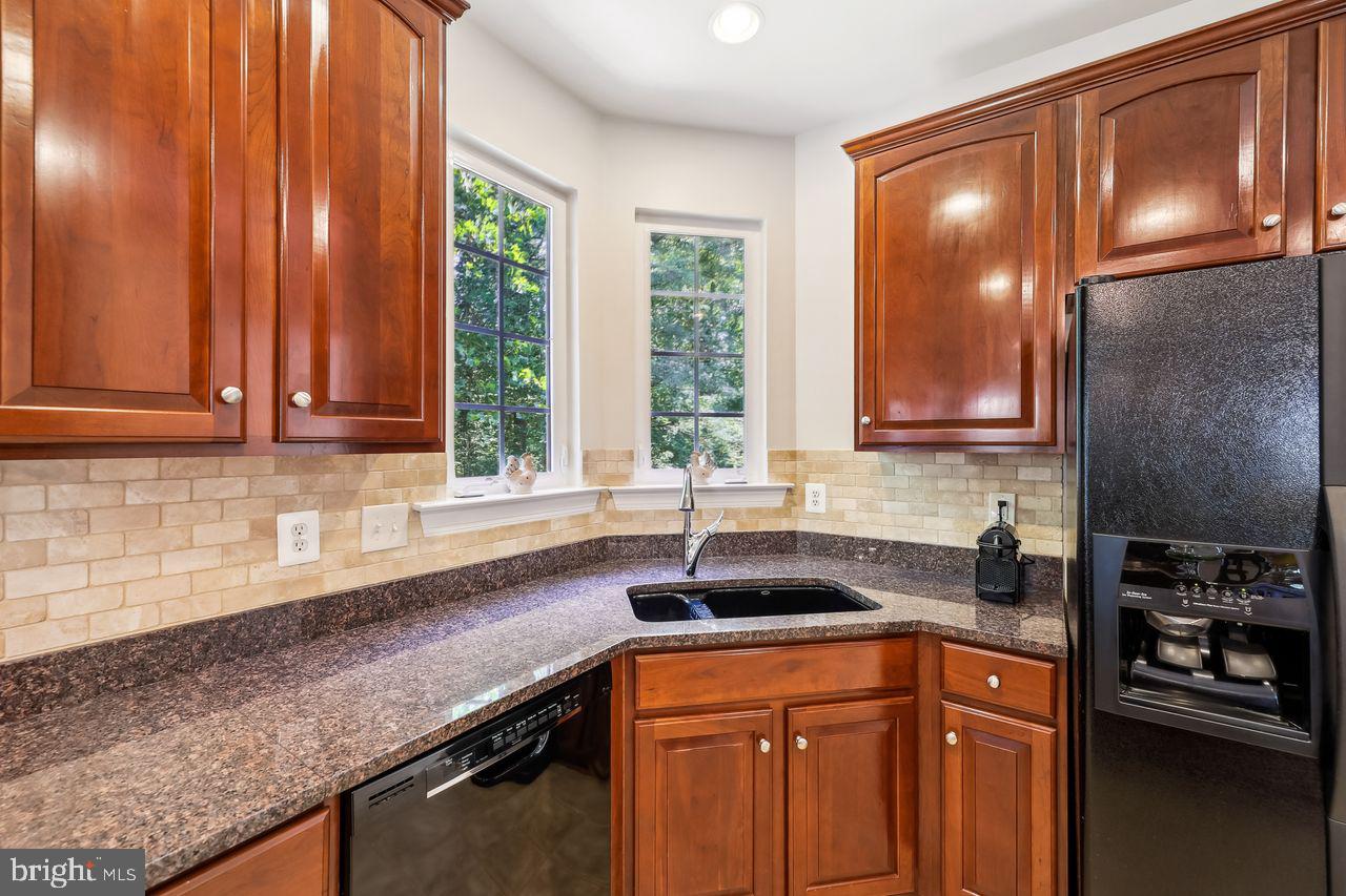 9920 Chessington Way Bowie, MD 20721 - Photo 14 of 63 Kitchen sink looking out the rear window