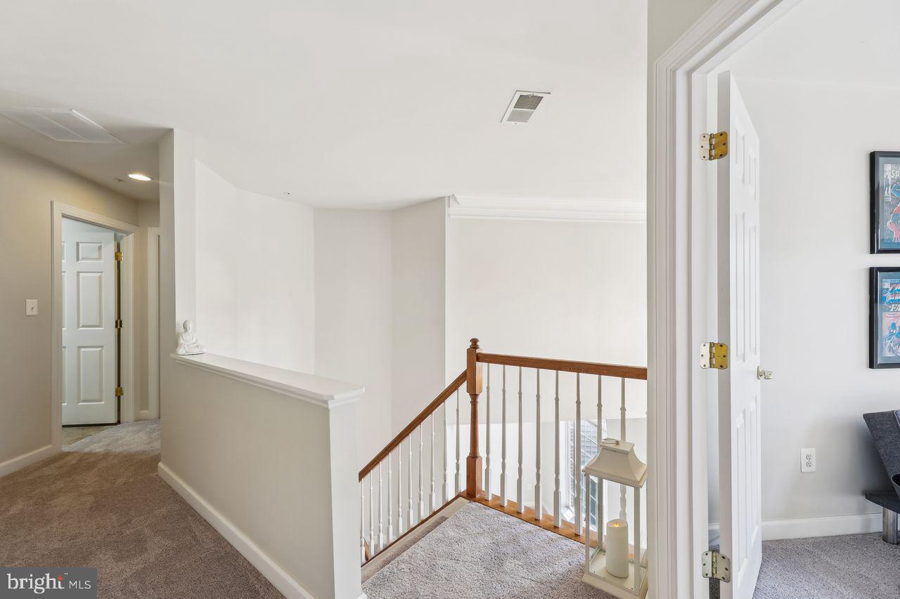 9920 Chessington Way Bowie, MD 20721 - Photo 28 of 63 Stairs from Upper-level view