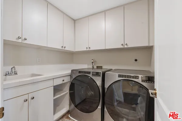 a view of a yard with an outdoor space