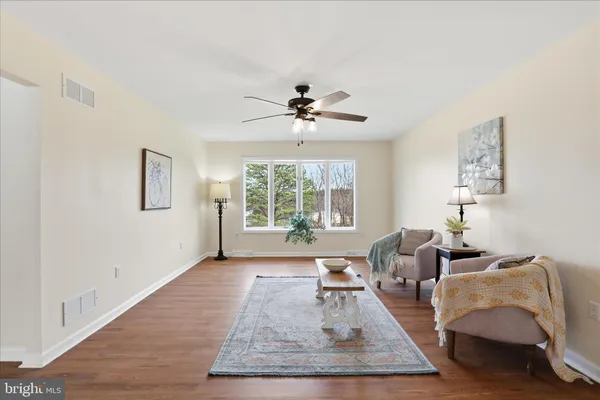 a kitchen with stainless steel appliances a sink stove and cabinets