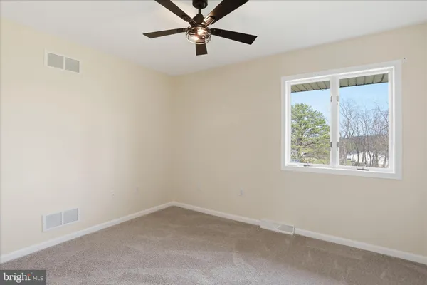 a room with furniture and a window