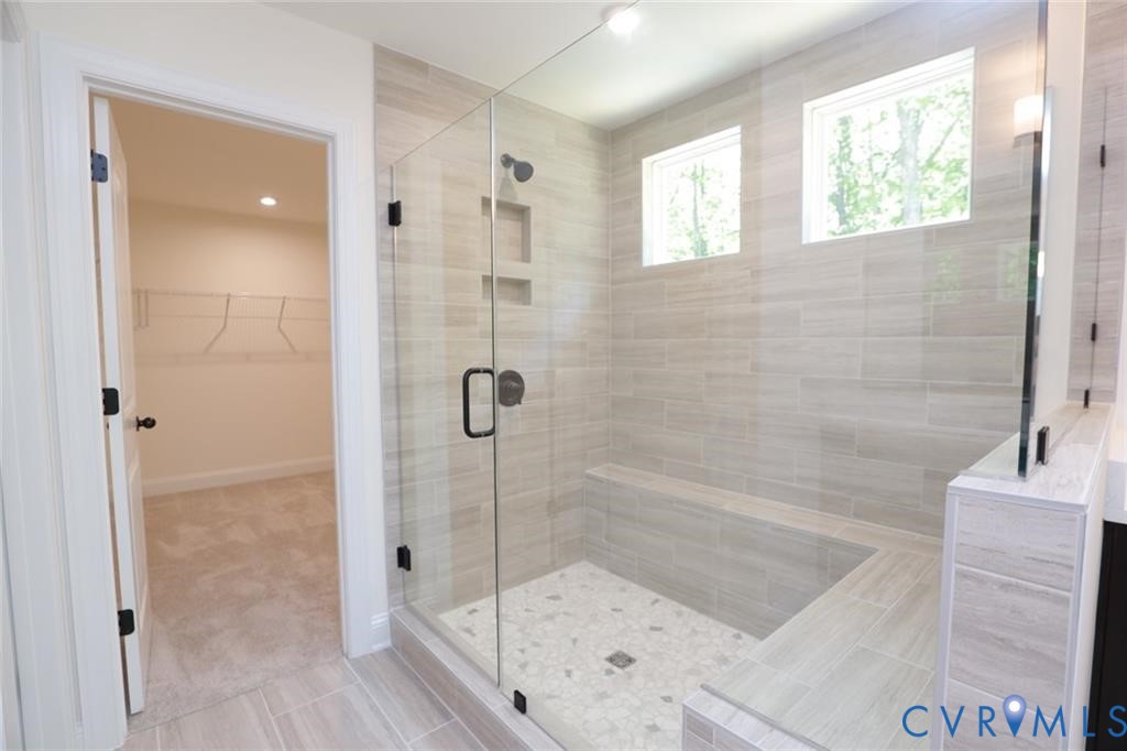 3911 Jett Court Gum Spring, VA 23065 - Photo 4 of 16 a bathroom with a shower