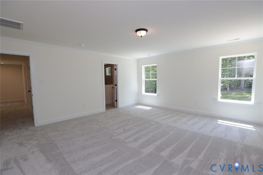 3911 Jett Court Gum Spring, VA 23065 - Photo 6 of 16 a view of an empty room with a window