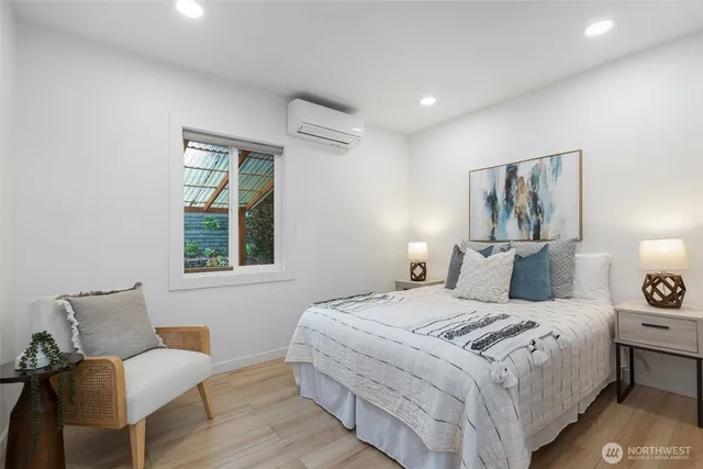 a bedroom with a bed and furniture