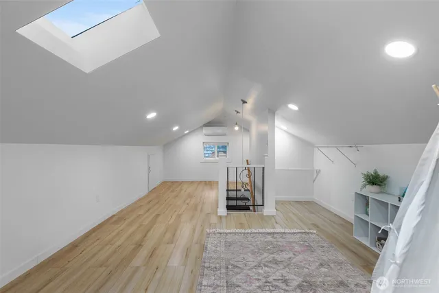 a bathroom with a sink a toilet and vanity