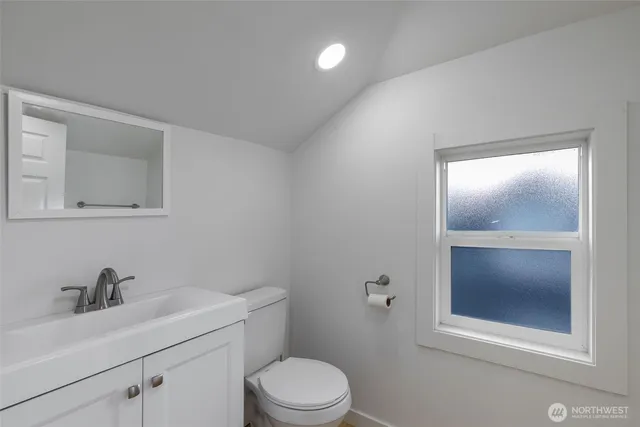 a workspace with furniture and window