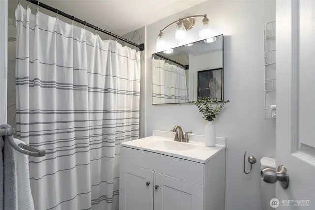 a view of storage and utility room with racks on the wall