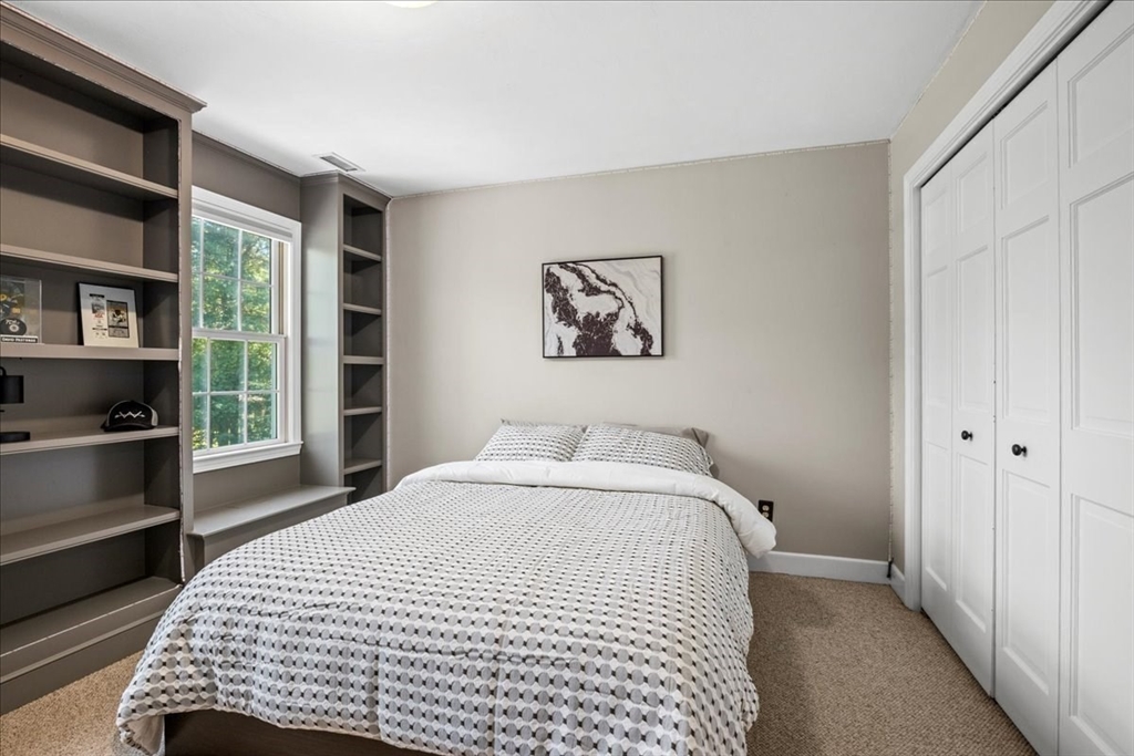 9 Auburn Road Millbury, MA 01527 - Photo 14 of 42 a bedroom with a bed and a window