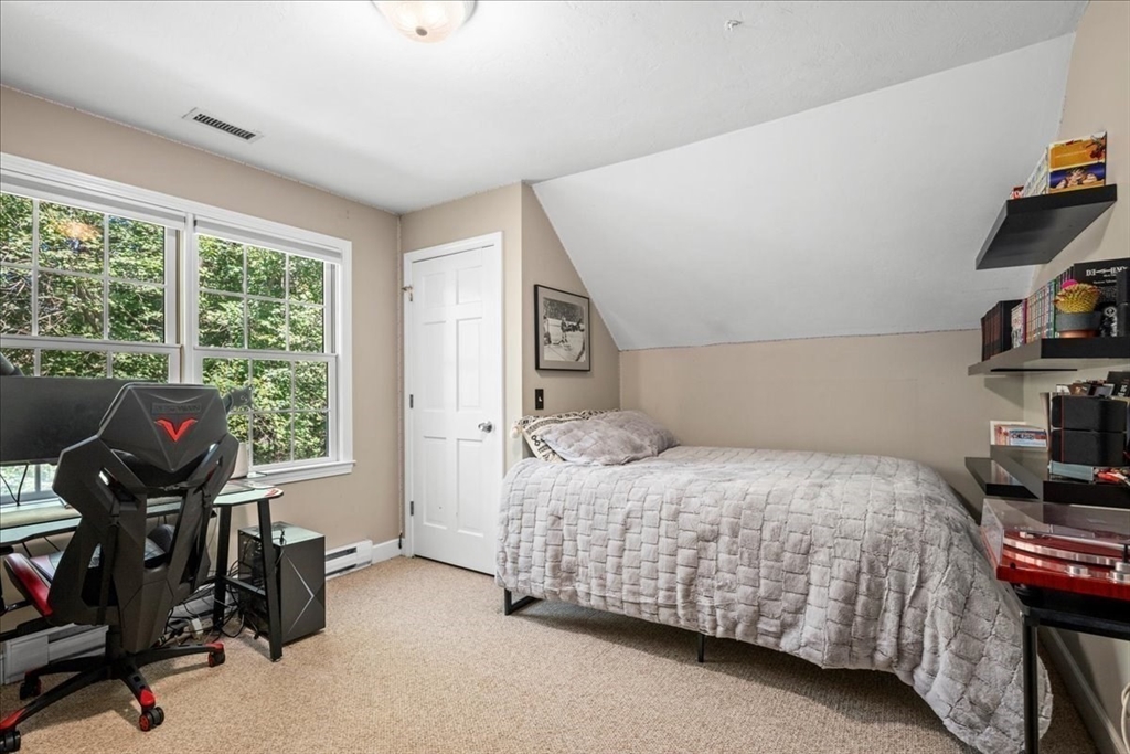 9 Auburn Road Millbury, MA 01527 - Photo 18 of 42 a bedroom with a bed and a window