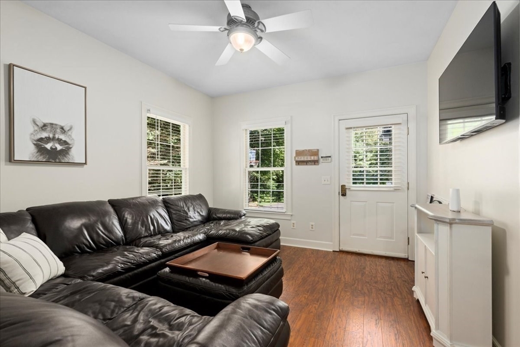 9 Auburn Road Millbury, MA 01527 - Photo 24 of 42 a living room with furniture and a flat screen tv