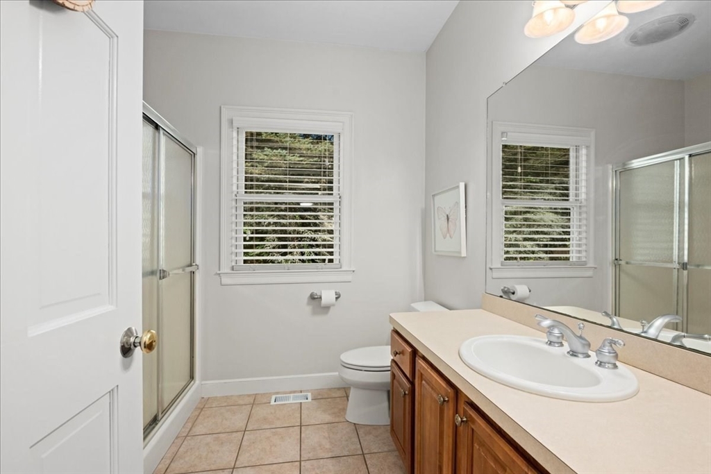 9 Auburn Road Millbury, MA 01527 - Photo 27 of 42 a bathroom with a sink a toilet and shower