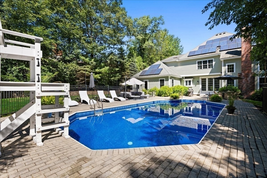 9 Auburn Road Millbury, MA 01527 - Photo 37 of 42 a view of a house with swimming pool and sitting area