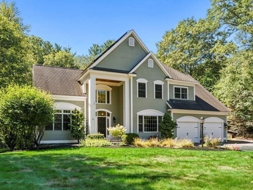 9 Auburn Road Millbury, MA 01527 - Photo 40 of 42 a front view of a house with a yard