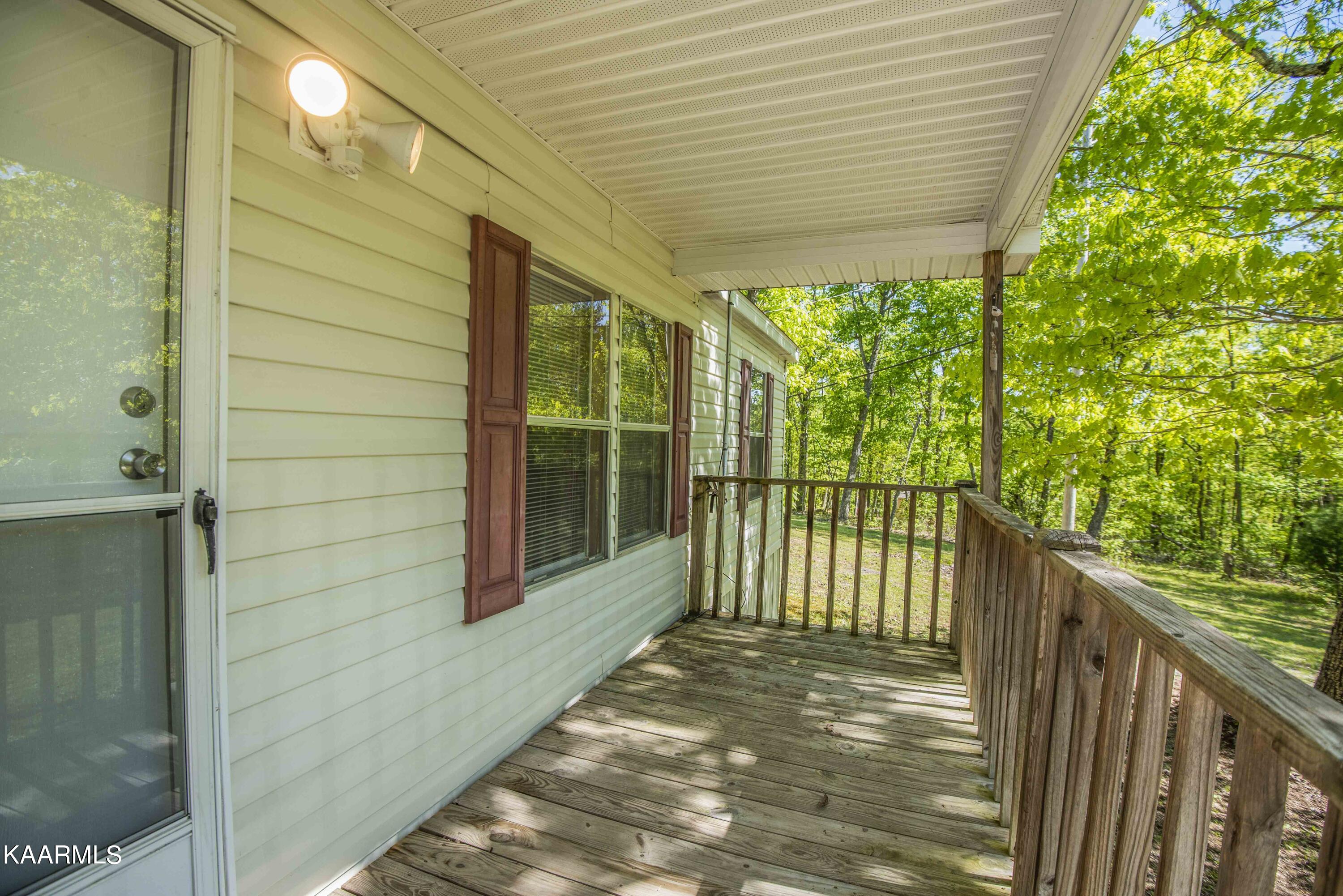 699 Lowes Gap Road Spring City, TN 37381 - Photo 11 of 41 Generous Front Porch