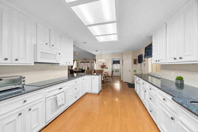 a large kitchen with cabinets